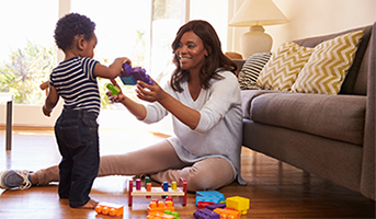Mom and son playing on the floor
