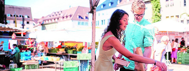 Couple using phone to make purchase