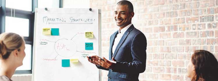 Man presenting to collegues